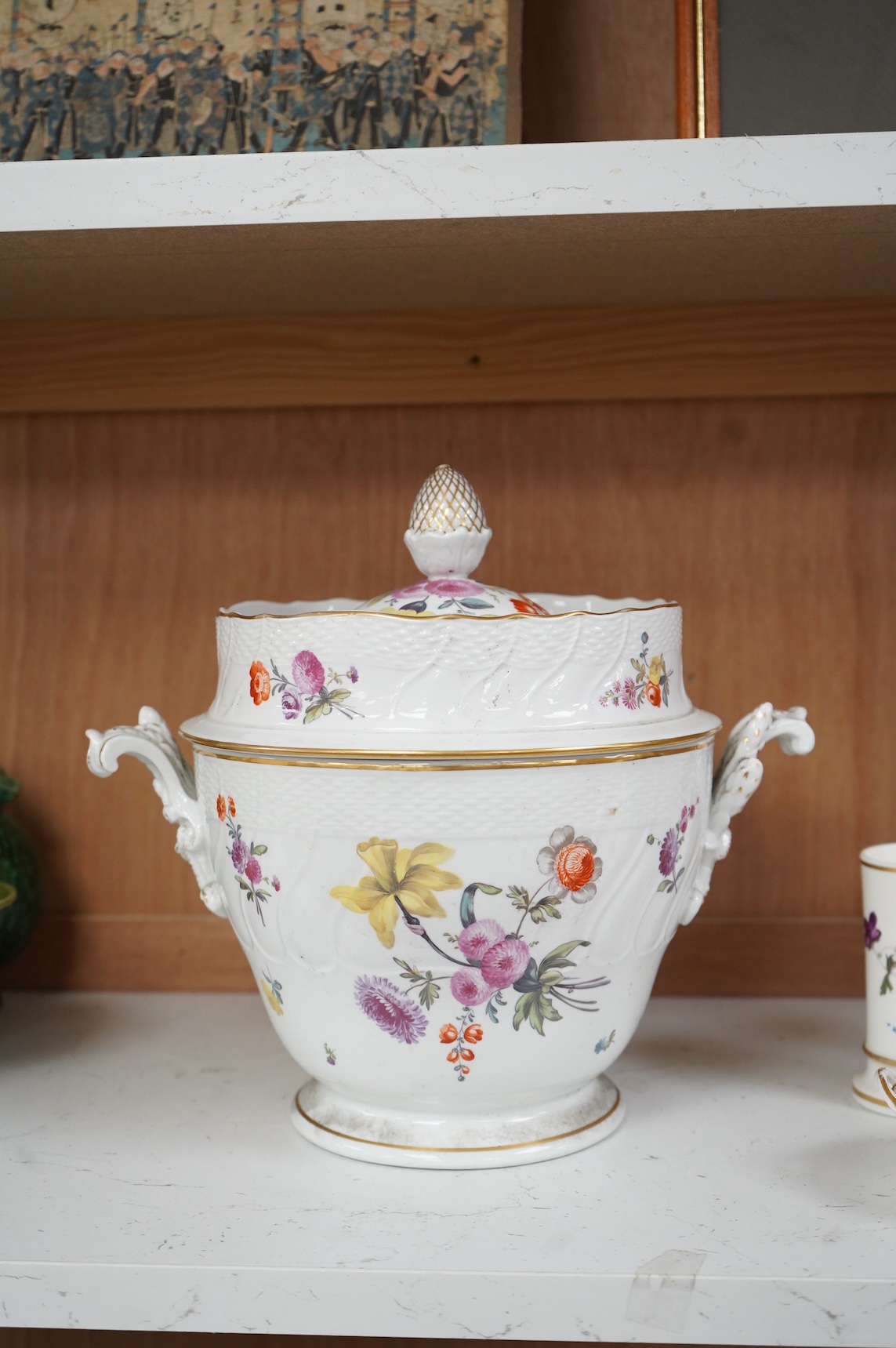A late 18th/early 19th century English porcelain ice cream pail and cover, decorated with flowers, 27cm high